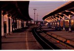 Action at Seaboard Station! A southbound pig train is headed to the platforms while a northbound pig train passes on the next track